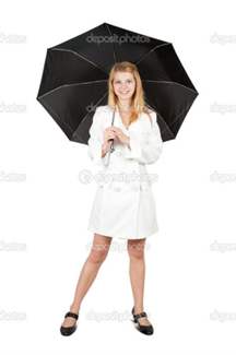 Pretty girl in cloak with umbrella. Isolated over white